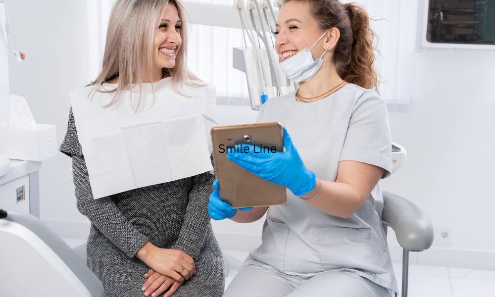 dentist explaining dental insurance coverage to patient during consultation